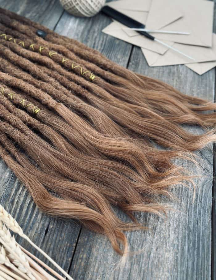 Natural looking dark brown copper dreads install DaddyDread