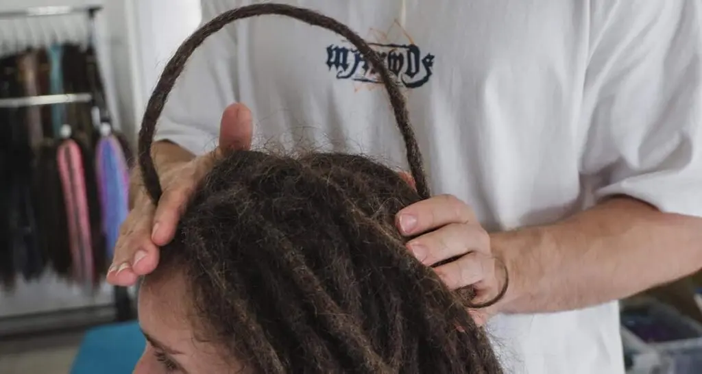 Woman with beautiful natural dreadlocks — female dread styles