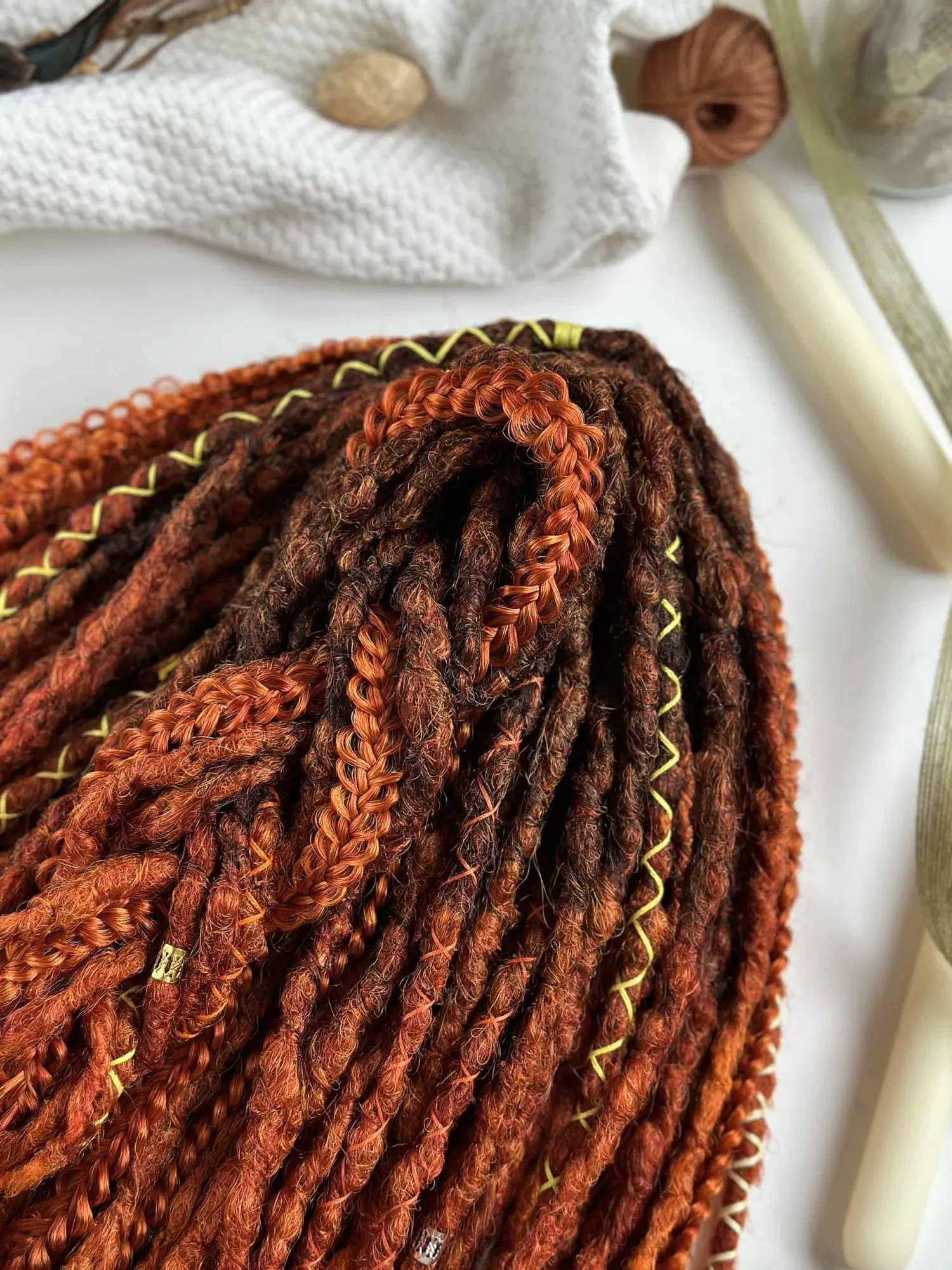 Copper ombre textured dreads ridged surface macro showing boiling-water-set bumpy finish