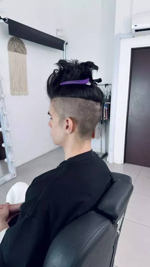 Sectioning the top of the head for short natural dreadlocks with an undercut